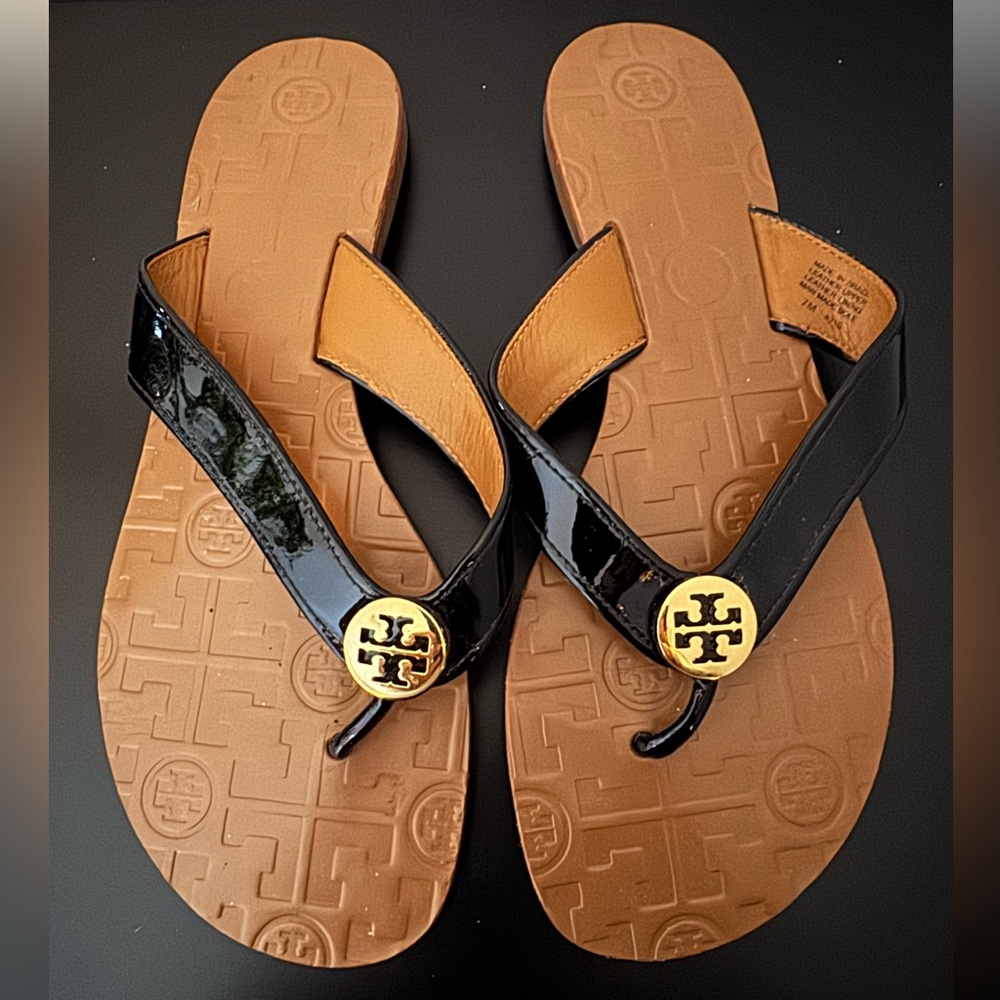 Tory Burch Black and Tan Flip Flops - Picture 2 of 3